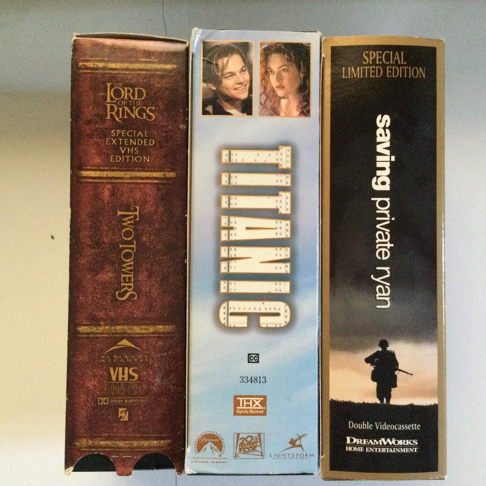 3 VHS movies Titanic, Saving Private Ryan, Lord of the rings double tapes